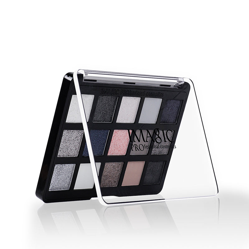 Styled flat lay of IMAGIC Aurora Palette with makeup props and background accessories